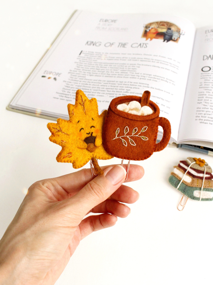 Felt autumn bookmark trio with maple leaf, mug, and books