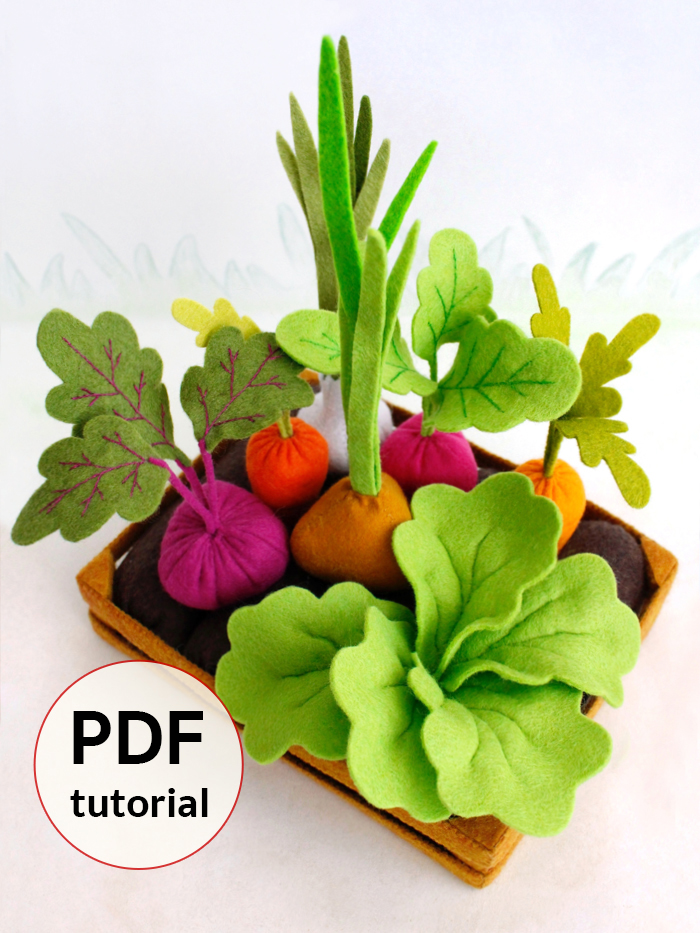 Felt vegetable garden pattern PDF with colorful vegetables and garden beds